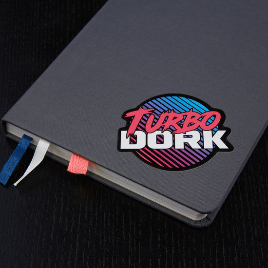 Turbo Dork logo sticker on book